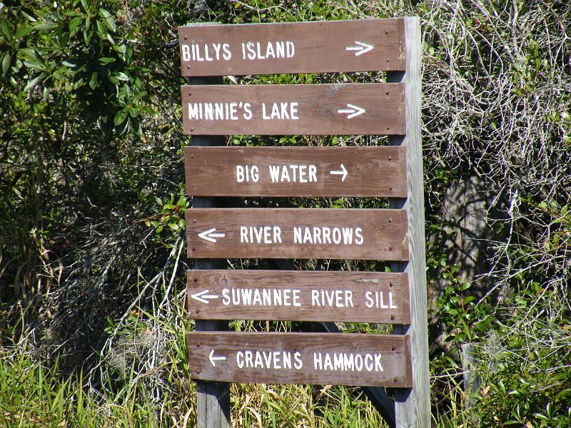 63-signs.JPG - This sign by the channel to the park gives choices of destinations.